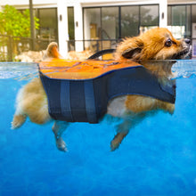 Load image into Gallery viewer, Puppy wearing an orange life preserver vest swimming in a pool
